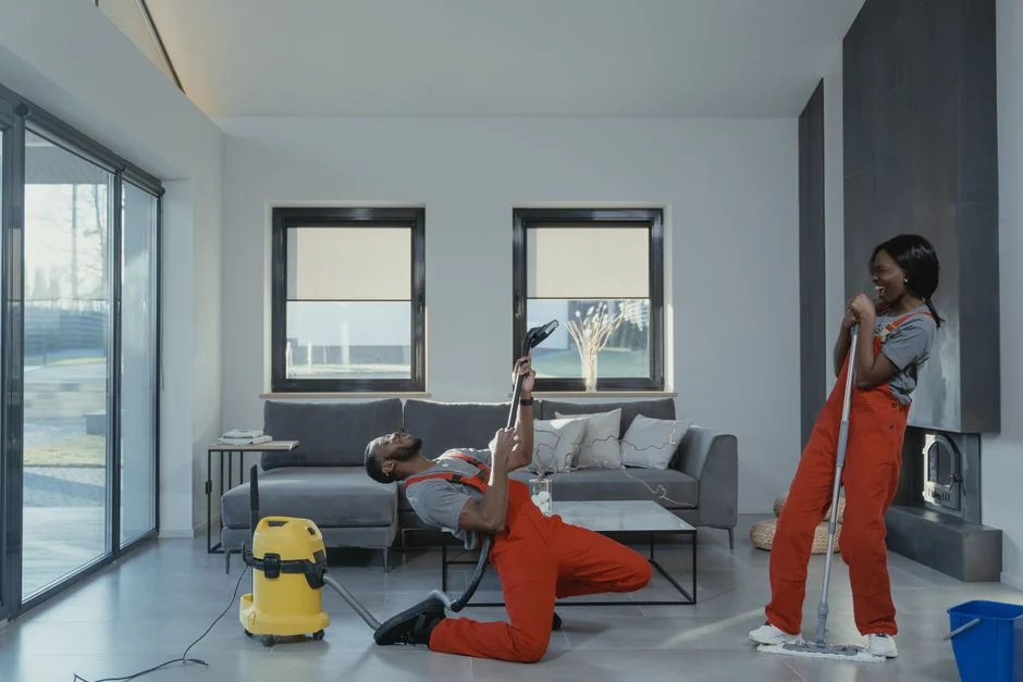 A person in full protective gear fumigating a room to ensure sterilization against viruses.